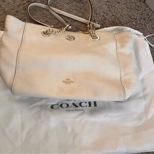 White Coach bag with dust bag included.